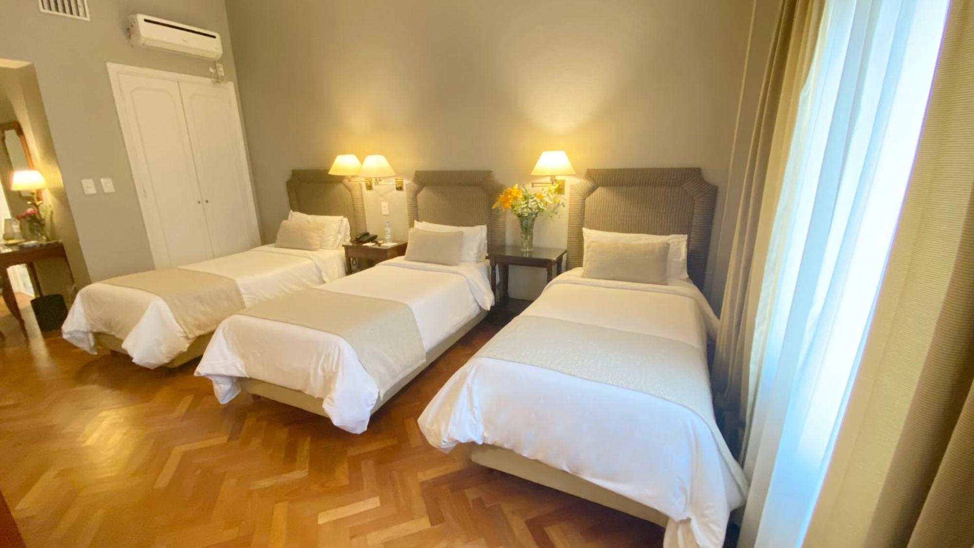 Triple Room 2 Single Beds 1 Extra Bed